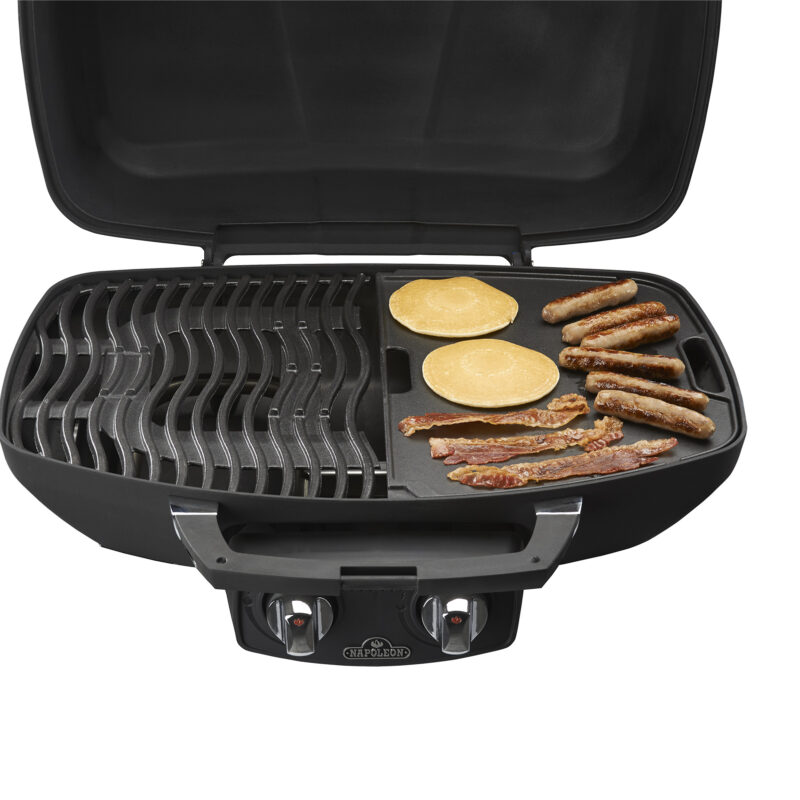 Travel Q flat grill in use